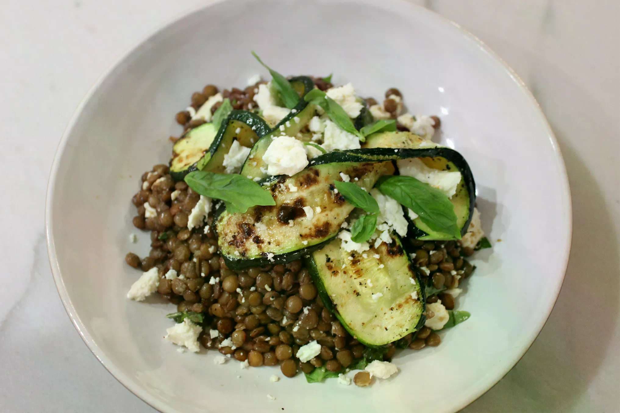 Lemon basil lentil salad with grilled zucchini & feta